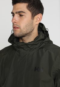 Helly Hansen DUBLINER JACKET - Casaco impermeável - forest night