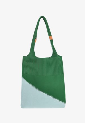 Grüne und hellblaue Tragetasche mit gerippter Textur, einer diagonalen Naht und einem Lederakzent an den Trägern. Mittelgroße Größe.