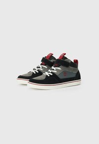 High-top sneakers in black, gray, and red suede with white laces, a Velcro strap, and a contrasting sole featuring a red accent line.