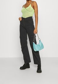 The Ragged Priest Top - green