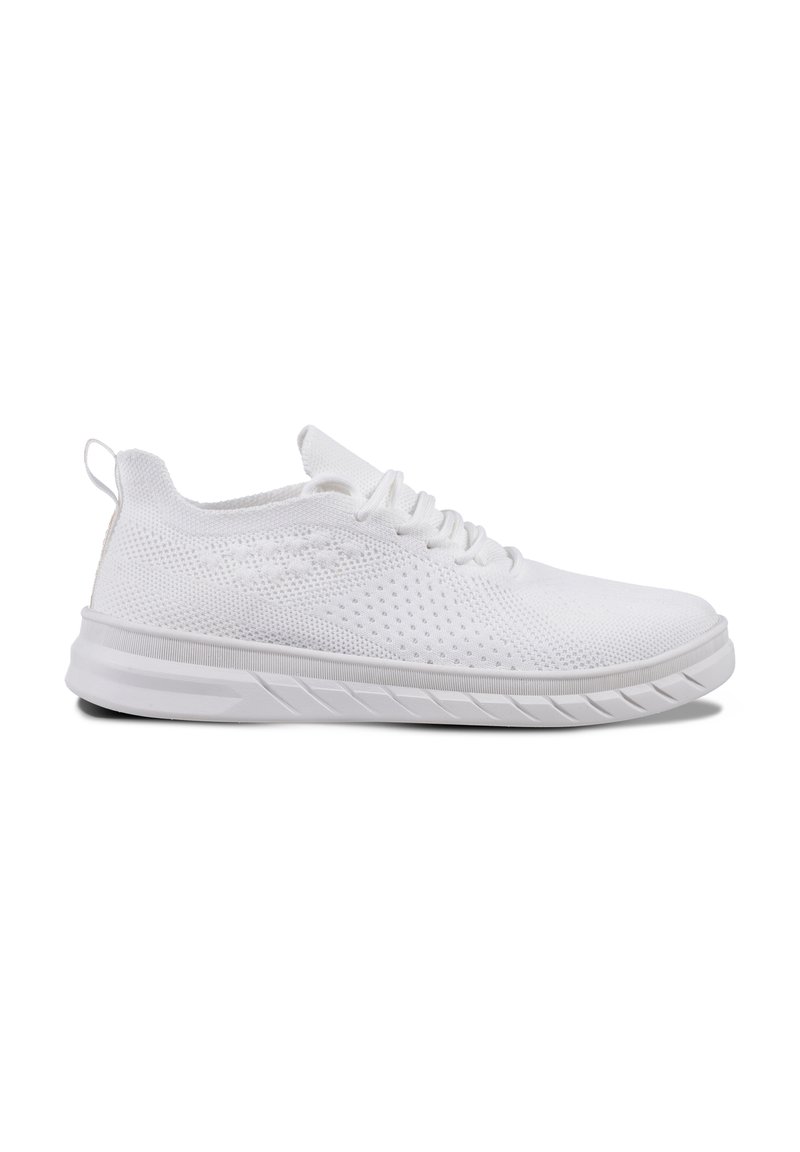 White athletic shoes with a breathable mesh upper, a cushioned sole, and flat laces. Features a pull tab at the back and textured traction on the sole.