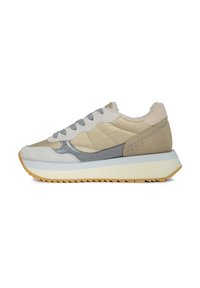 Beige and gray sneakers with suede and textile materials. Features a chunky sole, textured accents, and plush collar. Lace-up design.
