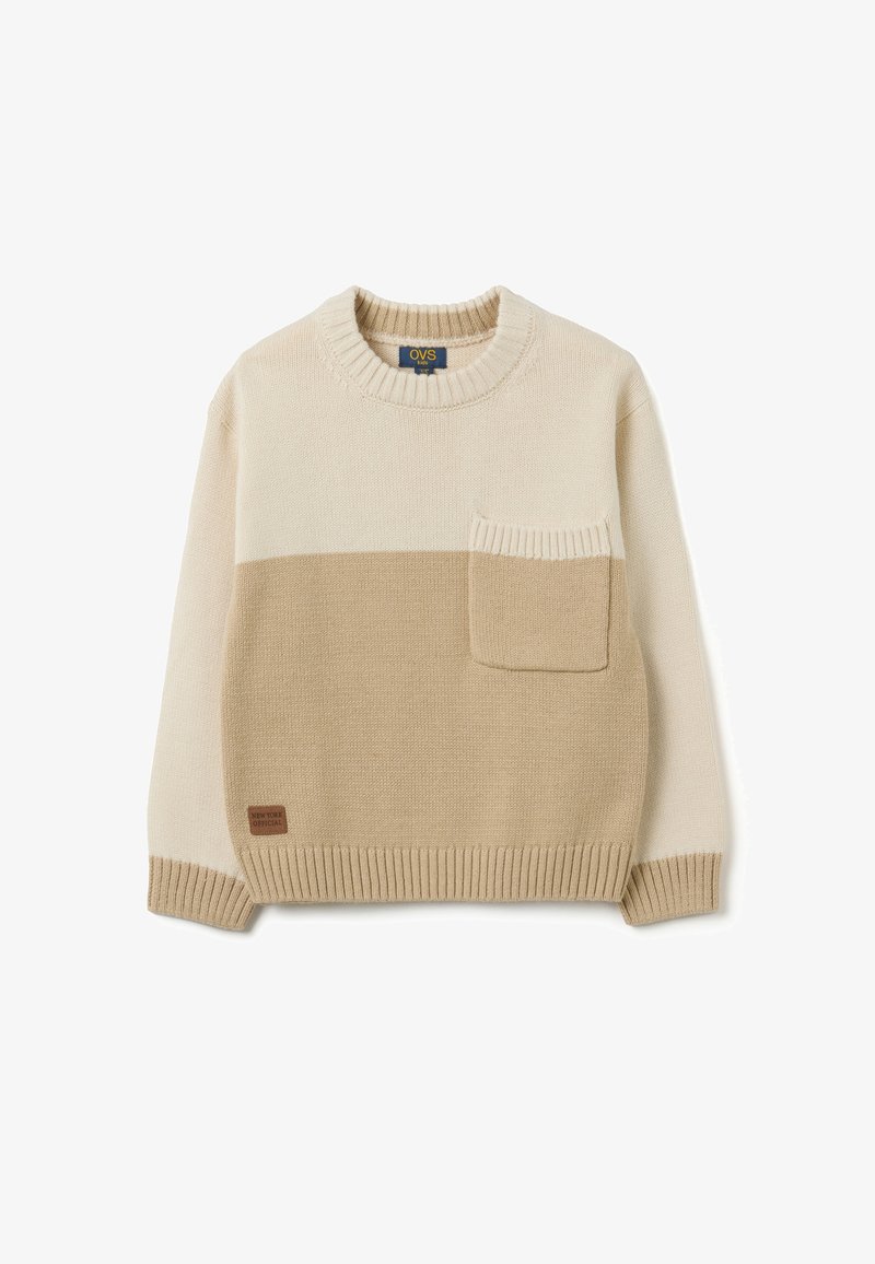 Beige gebreid sweater met een ronde halslijn, met een zak en een kleurblokontwerp in crème en lichtbruin. Ribgebreide manchetten en onderkant.