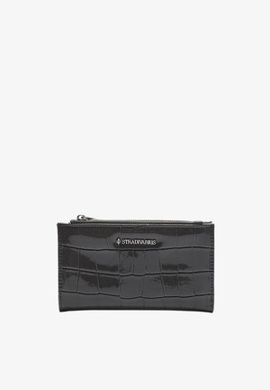 Black crocodile-textured wallet made of patent leather, featuring a zip closure and a silver logo embossed on the front.