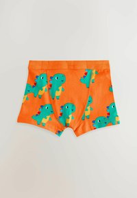 Boxer shorts arancioni con un motivo ripetuto di dinosauri verdi e accenti colorati. Realizzati in tessuto morbido con un elastico in vita.