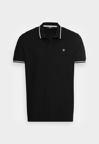 Schwarzes Poloshirt aus strukturiertem Stoff, mit kontrastierendem weißen Abschluss am Kragen und an den Ärmeln sowie einem kleinen Logo auf der linken Brust.