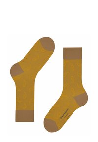 Calzini gialli con motivo paisley e punta e polsino marrone a contrasto. Realizzati in un morbido tessuto testurizzato. Taglia indicata sulla suola.