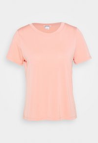 Tričko s krátkým rukávem vyrobené z jemné, broskvové látky; má kulatý výstřih a uvolněný střih s čistými, jednoduchými švy.