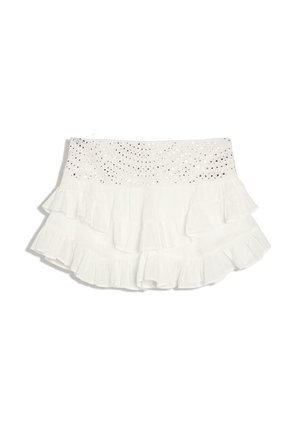 Mini-jupe blanche à volants avec ceinture en dentelle à œillets et ourlet à volants superposés, tissu léger, style estival décontracté.