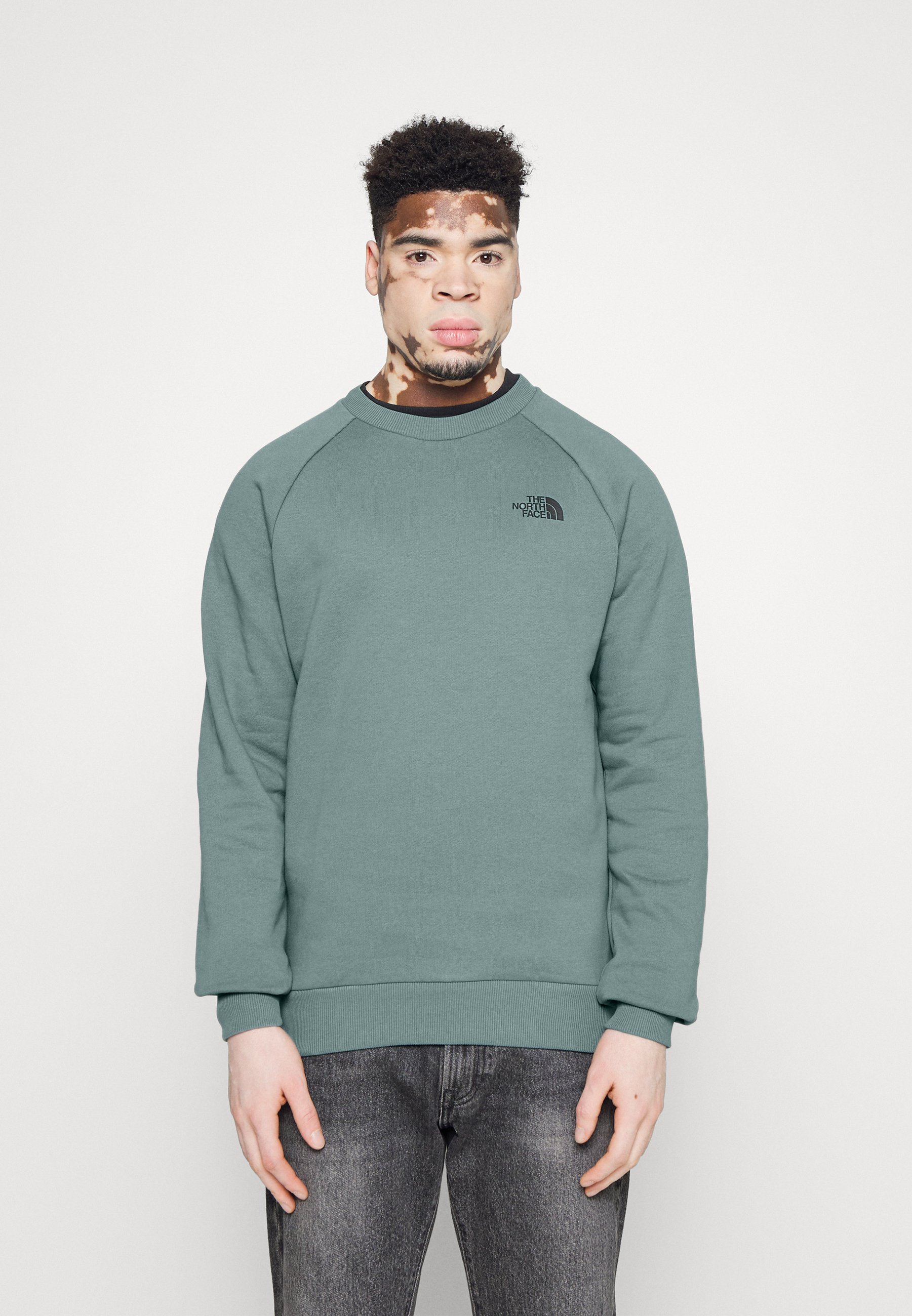 the north face raglan red box crewneck sweatshirt in black