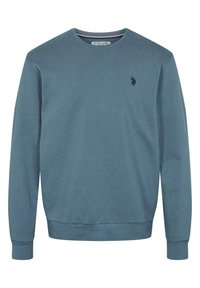 Modrá mikina vyrobená z měkké, texturované látky. Má dlouhé rukávy, kulatý výstřih a malé vyšívané logo na hrudi.