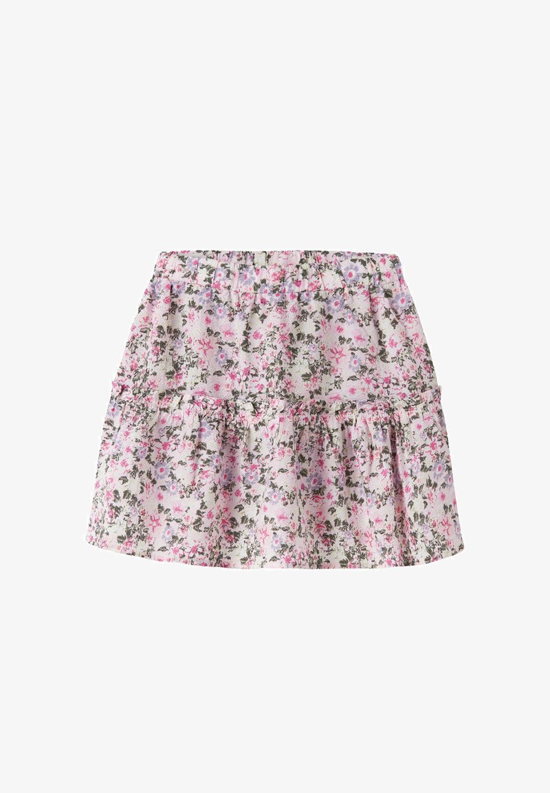 Jupe courte à motif floral avec des fleurs roses, violettes et vertes, et une ceinture élastique sur fond blanc.