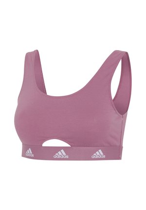 Pink sports bra with a scoop neckline, wide straps, and a cutout detail. Features a branded elastic band with white adidas logos. Soft fabric texture.