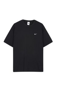 Tricou negru Nike din bumbac, cu guler rotund și mâneci scurte. Include un mic logo alb Nike pe pieptul stâng.
