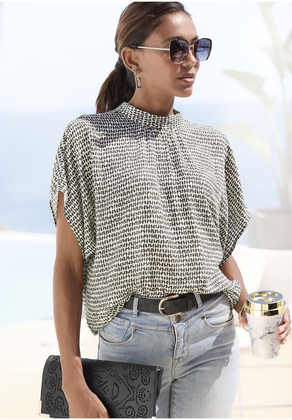 Bluse - creme schwarz bedruckt