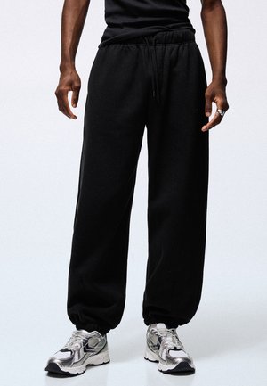 Bershka, JOGGER - TRACKSUIT BOTTOMS - Pantalon de survêtement - black