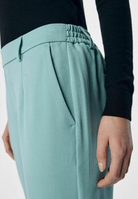 Object OBJLISA SLIM PANT - Püksid - dusty turquoise