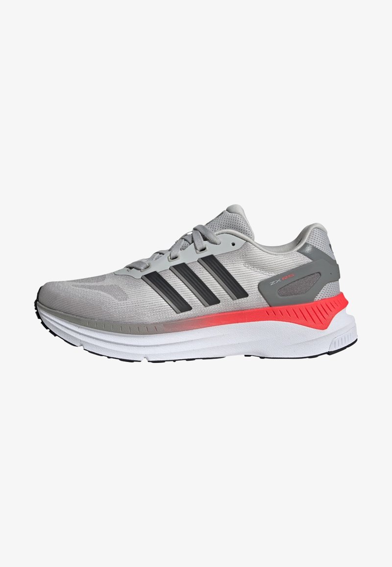 Light gray running shoe with black stripes, textured upper, and pink accents on the sole. Features rounded toe and cushioned midsole.