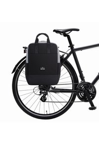 Black bicycle bag attached to a bike, featuring a rectangular shape, two handles, and a logo on the front. Textured fabric and minimal design.