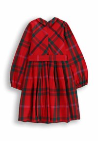 Czerwona sukienka w kratę z długimi rękawami, zaokrąglonym kołnierzykiem i elastycznymi mankietami. Posiada talię podkreśloną paskiem oraz plisowaną spódnicę.