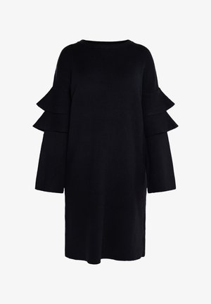 Mustatan kudumoe kleit, millel on kihiline rüüne aksent käistel, ümmargune kaelus ja lõdva lõikega. Sile tekstuur pikkae varrukatega.