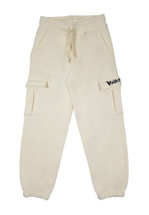Pantaloni jogger color crema realizzati in morbido tessuto, con cintura elastica, tasche laterali e logo nero sulla tasca sinistra. Con cordino regolabile.