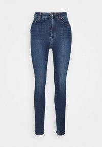 Jeans ajustados de talle alto en azul oscuro, con botón frontal, cremallera y diseño de cinco bolsillos sobre un fondo claro.