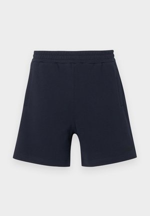 Marineblå fritidsshorts med elastisk midjebånd og sidelommer, med subtil logo på nedre venstre ben.