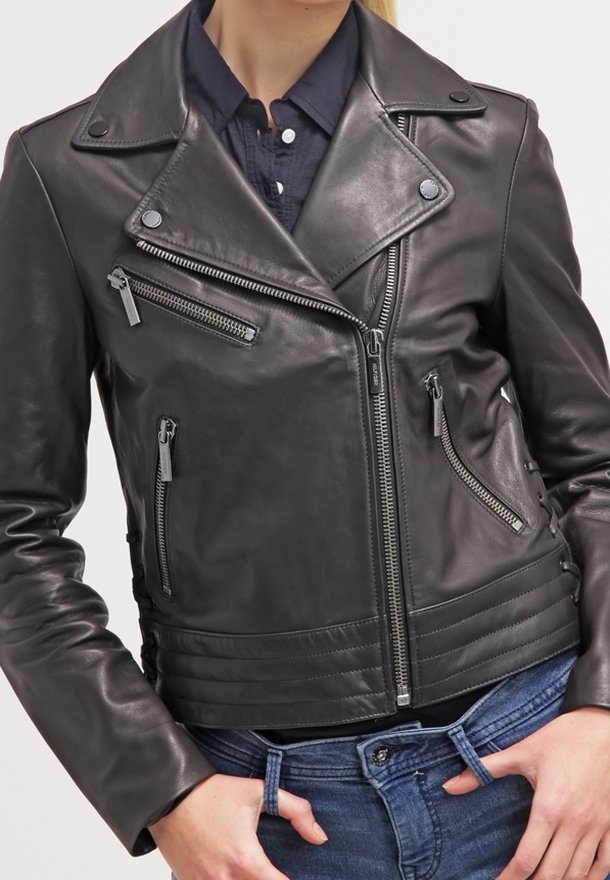 Black leather motorcycle jacket with asymmetrical zippers, snap collar, and ribbed waist detailing, showcasing a fitted silhouette.