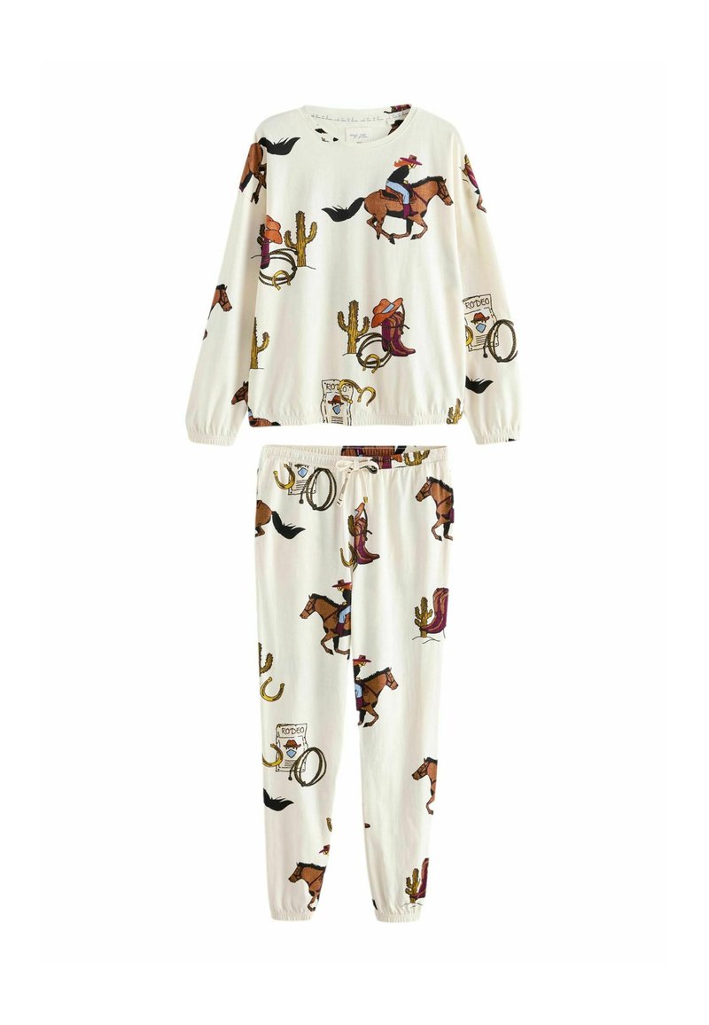 Set de pijama din două piese, crem, cu modele de cowboy și cai. Material moale, ușor, cu manșete și talie elastică, oferind o potrivire lejeră.