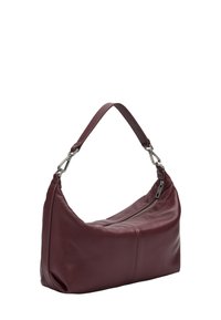 Bordowa skórzana torebka na ramię o zaokrąglonym kształcie, z suwakiem i pojedynczym regulowanym paskiem z metalowymi srebrnymi elementami.