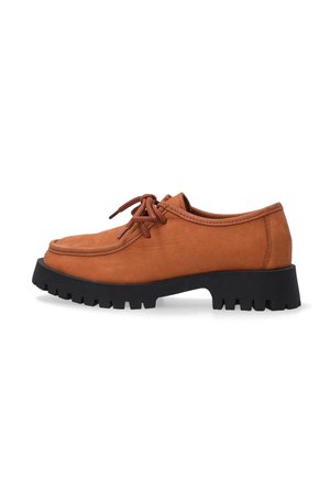 Brown leather lace-up shoe with a round toe, black rubber sole, textured upper, and tonal laces. Features stitching detail along the edge.