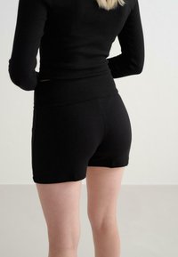 aim’n® Short - black