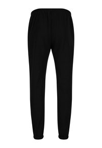 Schwarze Jogginghosen mit einem elastischen Bund und enganliegenden Bündchen. Hergestellt aus weichem, leichtem Stoff mit einer glatten Textur.