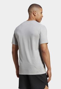 adidas Performance ESSENTIALS FEELREADY - Sports T-shirts - grey/black