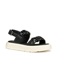 Schwarze Ledersandalen mit zwei dicken, gerafften Riemen und einer verstellbaren Schnalle am Knöchel. Mit einer strukturierten, cremefarbenen Gummisohle.