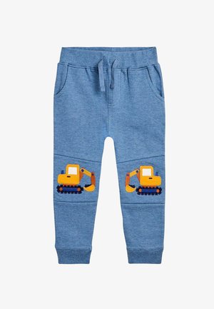 Modré bavlnené tepláky s elastickým pásom a šnúrkou na stiahnutie. Na oboch nohách sú žlté aplikačky v tvare bagra. Obsahujú dve bočné vrecká.