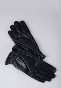 Black leather gloves with a smooth texture, featuring gathered wrist detailing and separate fingers. The design is simple and sleek.
