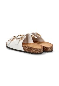 Sandalias blancas con hebillas y tres correas ajustables, plantilla de corcho, suela texturizada y acabado en cuero suave. Acentos en hardware de tono dorado.