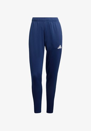 Pantaloni sportivi blu navy con vestibilità affusolata, vita elastica e logo Adidas bianco sulla coscia destra. Realizzati in materiale liscio e leggero.