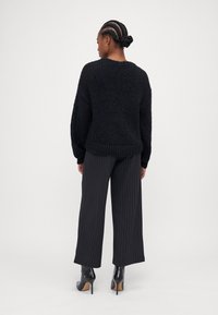 Vero Moda Petite VMALOA BOW CARDIGAN - Neuletakki - black