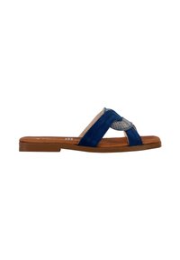 Blauwe suède instapsandalen met een kruisbandontwerp, tan voetbed en mesh accenten. Platte zool met een eenvoudig, minimalistisch ontwerp.