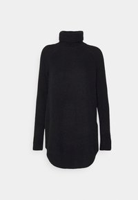 Svart polotröja tillverkad av strukturerad stickad tyg. Har långa ärmar och en något rundad nederkant. Ingen synlig hårdvara eller mönster.