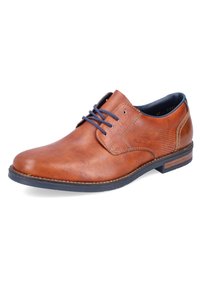 Chaussure en cuir marron à lacets avec une finition lisse, dotée d'une doublure bleu marine, de subtils détails perforés et d'une semelle sombre contrastante.
