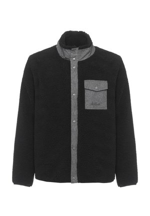 Giacca in pile nera con patta grigia chiusa da bottoni a pressione e taschino sul petto con bottoni a pressione grigi, caratterizzata da colletto alto e maniche lunghe.