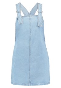 Ljust blå denimoverallklänning med justerbara axelremmar, rak skärning och en mittsöm fram. Klassisk design med ett avslappnat utseende.