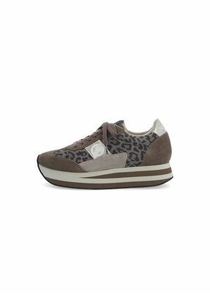 Brown and beige sneaker with leopard print fabric, lace-up front, and thick striped sole.