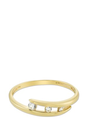 Gold ring with a sleek design featuring three round diamonds set asymmetrically along the band. Smooth texture with a polished finish.