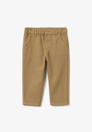 Beige Baumwollhosen mit elastischem Bund, Seitentaschen, glatter Textur und sauberen Nähten, die für Komfort und einfache Handhabung entworfen wurden.