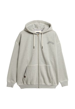 Haut de sweatshirt zippé gris clair en mélange de coton, avec capuche, poches avant et un petit logo sur la poitrine. Texture douce, coupe oversize.
